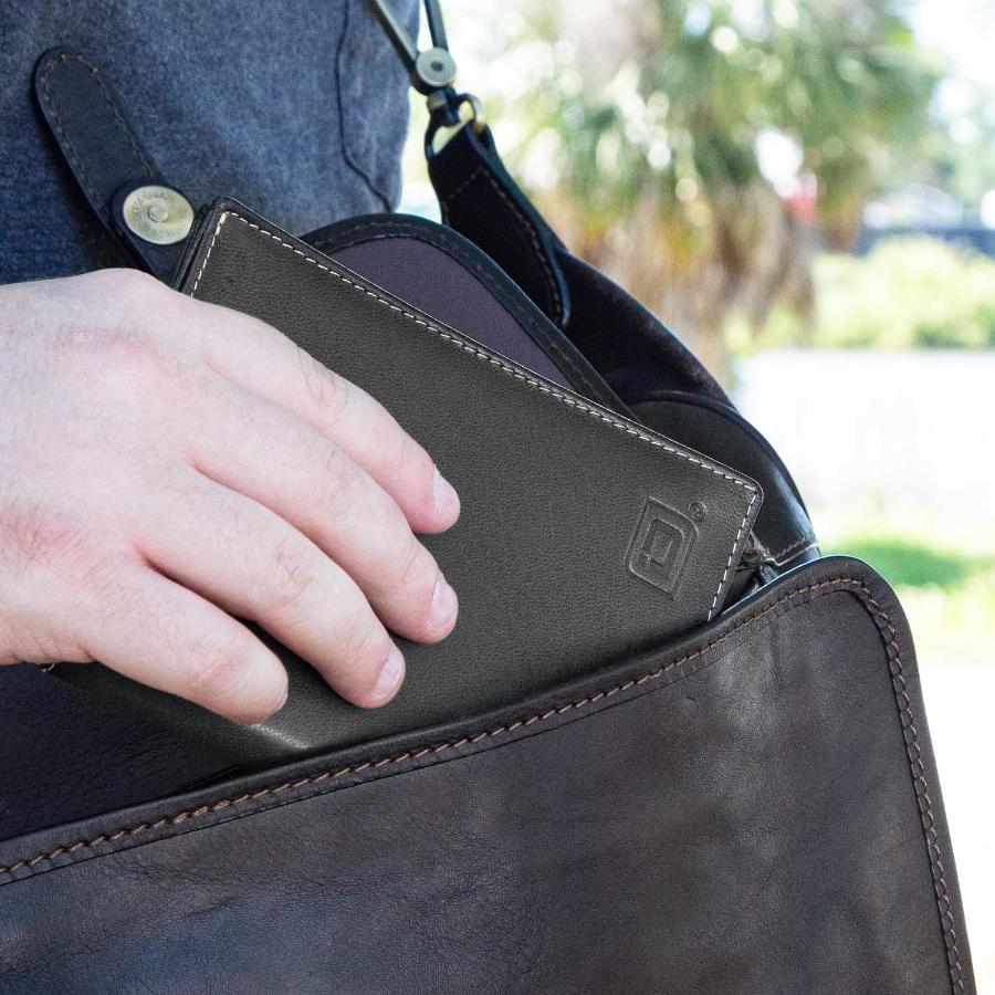 RFID Blocking Leather Passport Wallet in a travel bag pocket