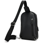 Black leather sling bag with gold hardware on a white background