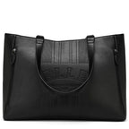 Black leather handbag with 'ELLE' branding on a white background