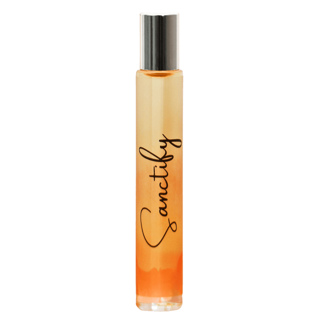 Perfume bottle with 'Sanctify' branding on a gradient background