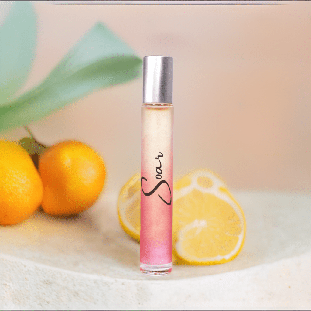 Soar Rollerball Perfume in travel size essentials with citrus notes.