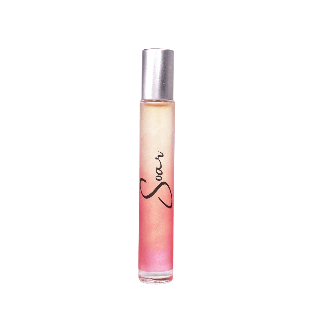 Soar Rollerball Perfume in travel size essentials bottle.
