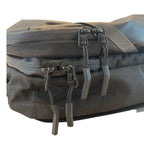 Gray tactical pouch with multiple zippers and straps on a white background