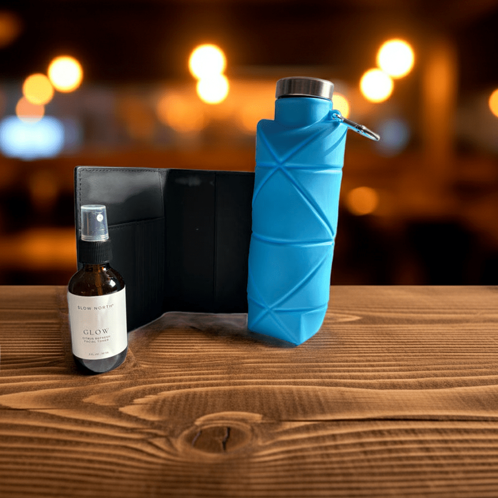 ✈️ The Jetsetter travel size essentials in blue water bottle, toner, and passport wallet.