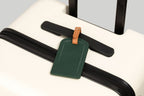 The Luggage Tag on a suitcase, ideal for travel essentials.