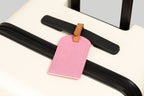 The Luggage Tag on a suitcase, perfect for travel size essentials.