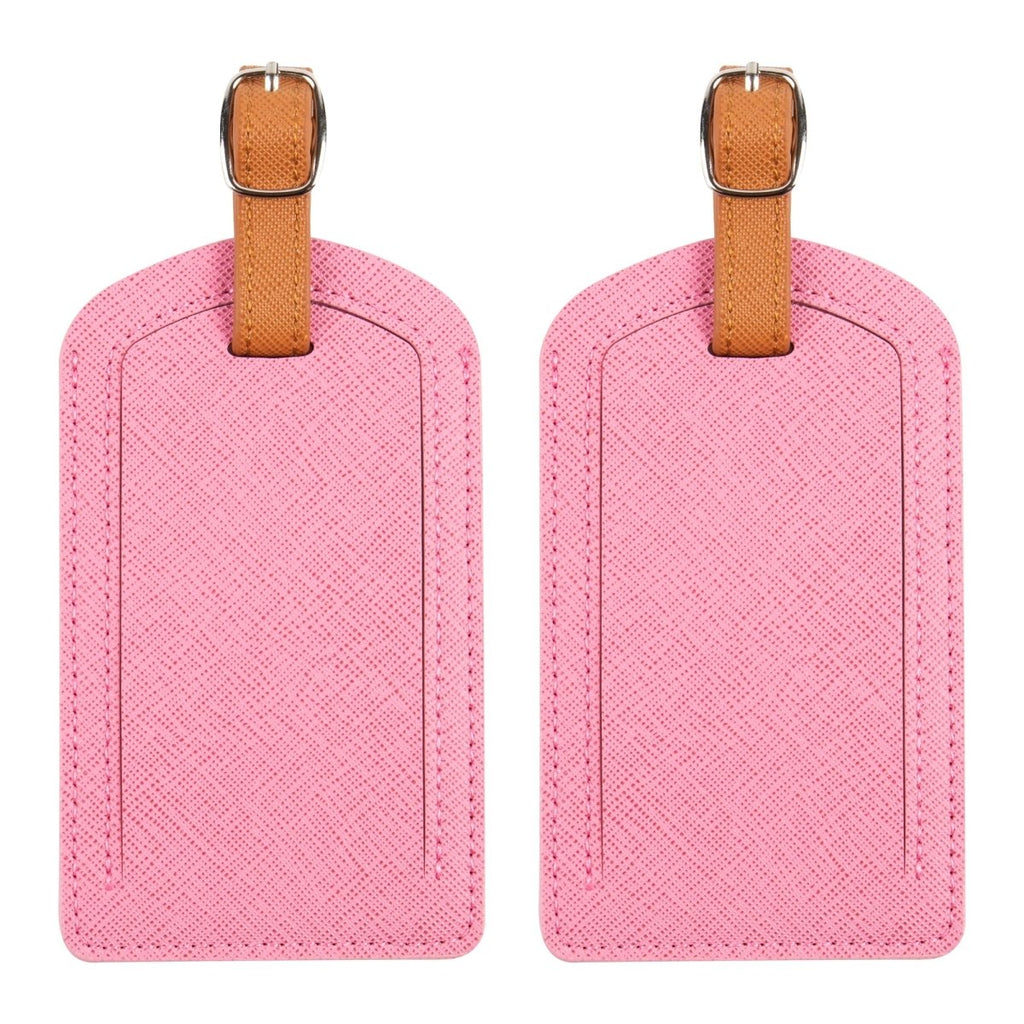The Luggage Tag in pink PU leather, travel essentials