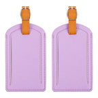 The Luggage Tag in purple with orange strap for travel.