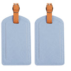 The Luggage Tag in blue PU leather, perfect for travel.