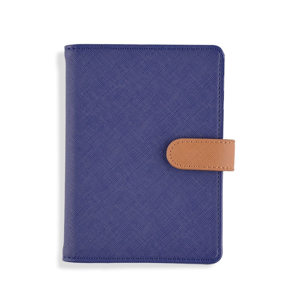 The Passport Wallet in stylish purple, ideal for travel size essentials.