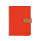 The Passport Wallet in vibrant red, ideal for travel size essentials.