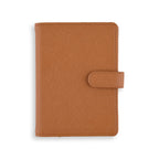 The Passport Wallet in brown, a stylish travel organizer.