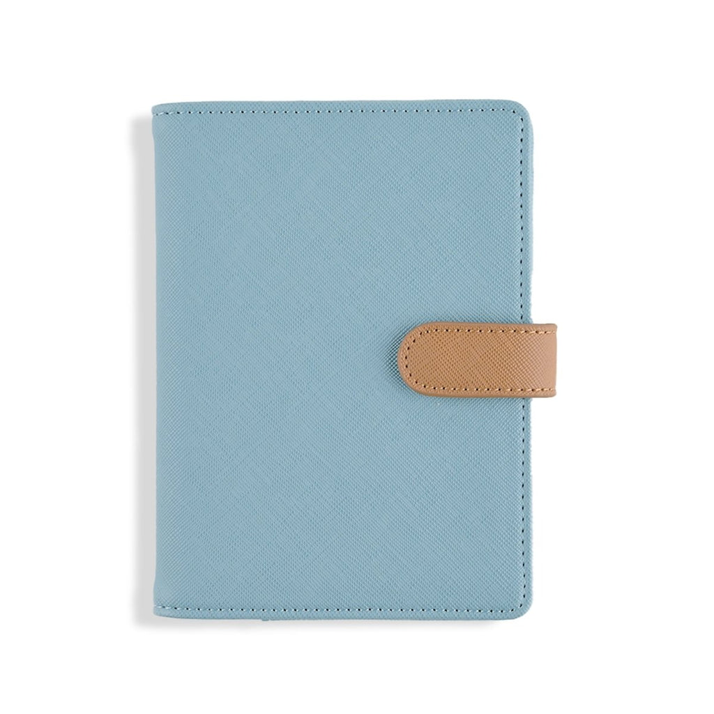 The Passport Wallet in blue, stylish travel organizer for essentials.