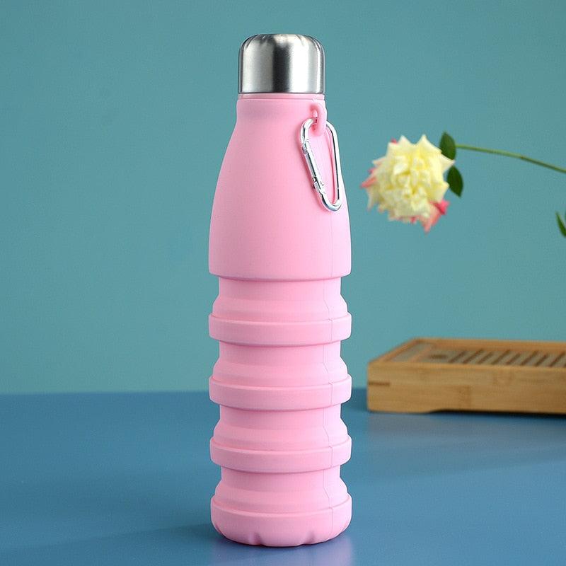 The Pro-Travel Collapsible Bottle (550ml) in pink color