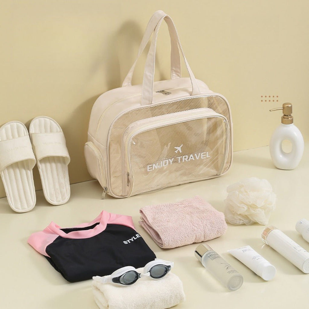 The Shoreline Transparent Wet/Dry Bag with travel size essentials