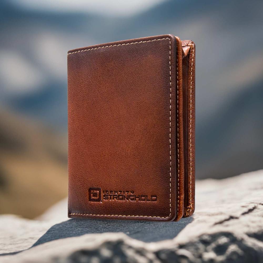 The Waltlet - RFID Secure Minimalist Wallet on a rock outdoors.