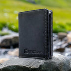 The Waltlet - RFID Secure Minimalist Wallet on a stone near water