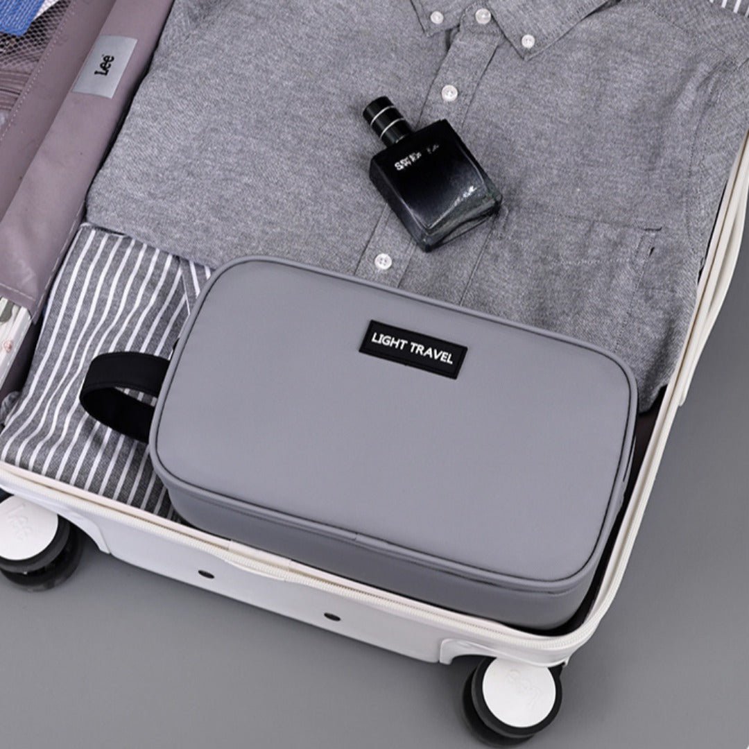 Triple-Layer Men's Grooming & Toiletry Bag in suitcase