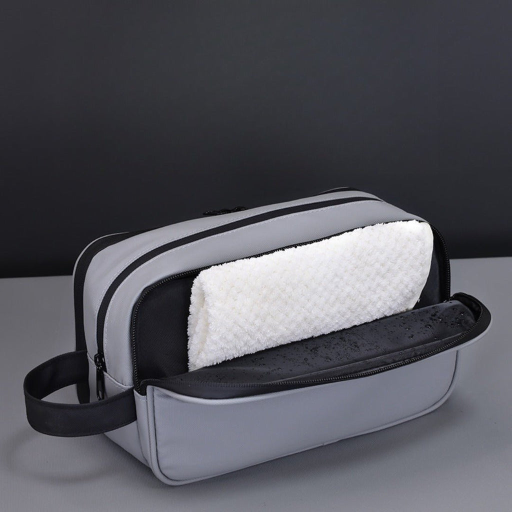 Triple-Layer Men's Grooming & Toiletry Bag open view with towel