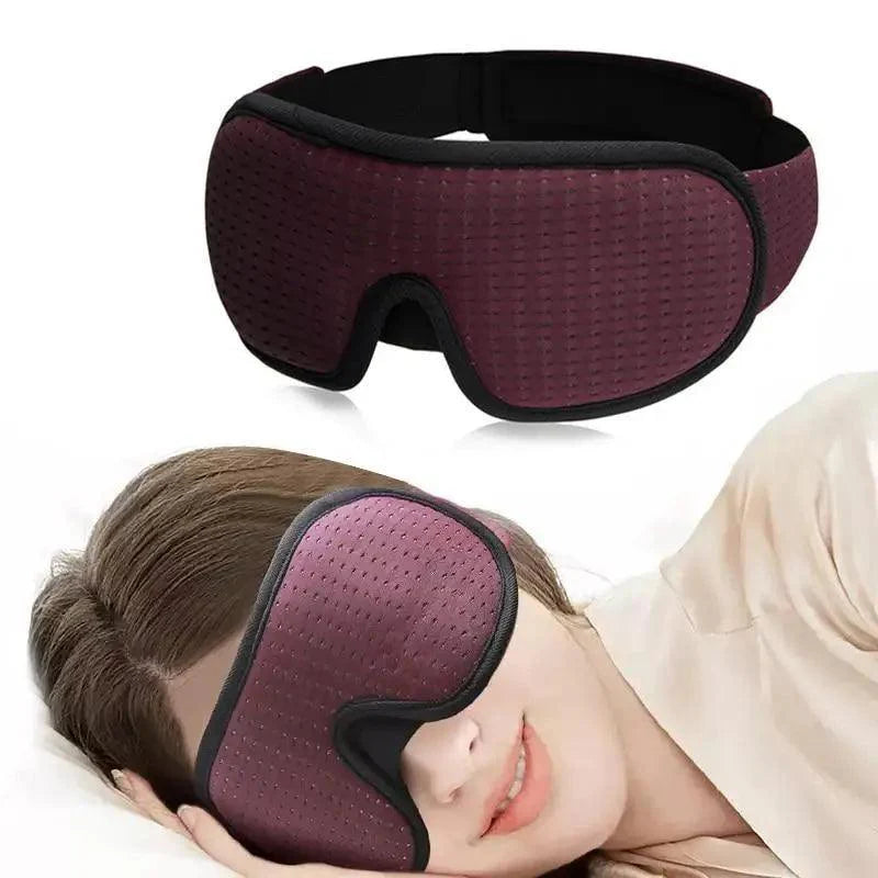 Purple sleep mask worn by a person on a white background