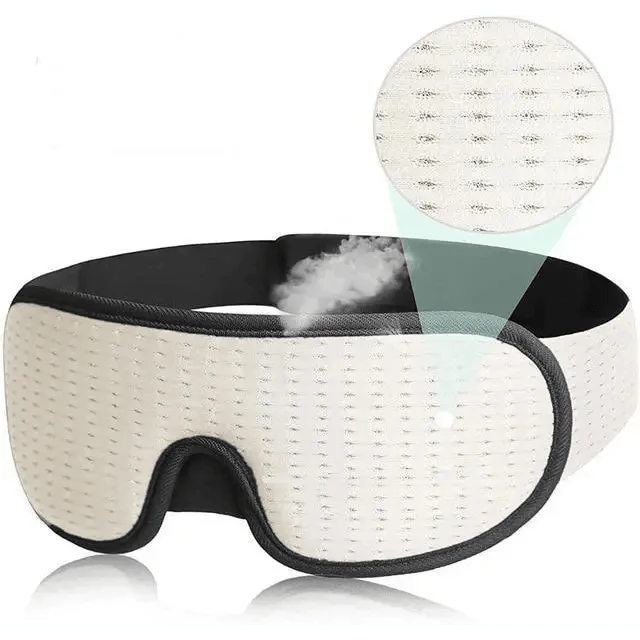 White sleep mask with a close-up of the breathable mesh fabric on a white background.