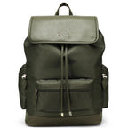 Green backpack with multiple pockets and straps on a white background