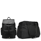 Two black backpacks on a white background
