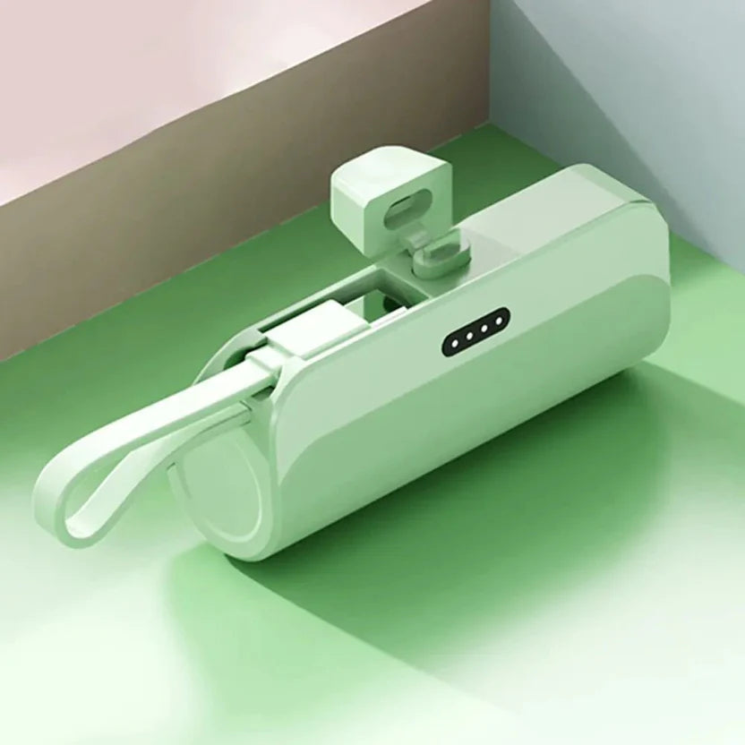 Green phone charger that plugs directly into the phone with a spare plug for an additional advice, USB-C connector.